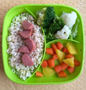 Toddler dinners cauliflower rice with barley sausage broccoli and carrots